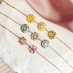 Personalisiertes Drehbares Geburtsblumen Armband mit Geburtssteinen – 1–9 Blumen wählbar, spielbarer Schmuck Geschenk für Sie