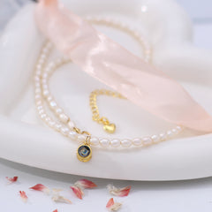 Personalisierte Perlenkette mit Foto Projektion – Kette mit Bild und rundem Gold-Silber Anhänger